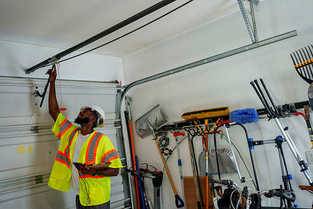 Professional Garage Door Panel Replacement technician working in North Grosvenor Dale, CT
